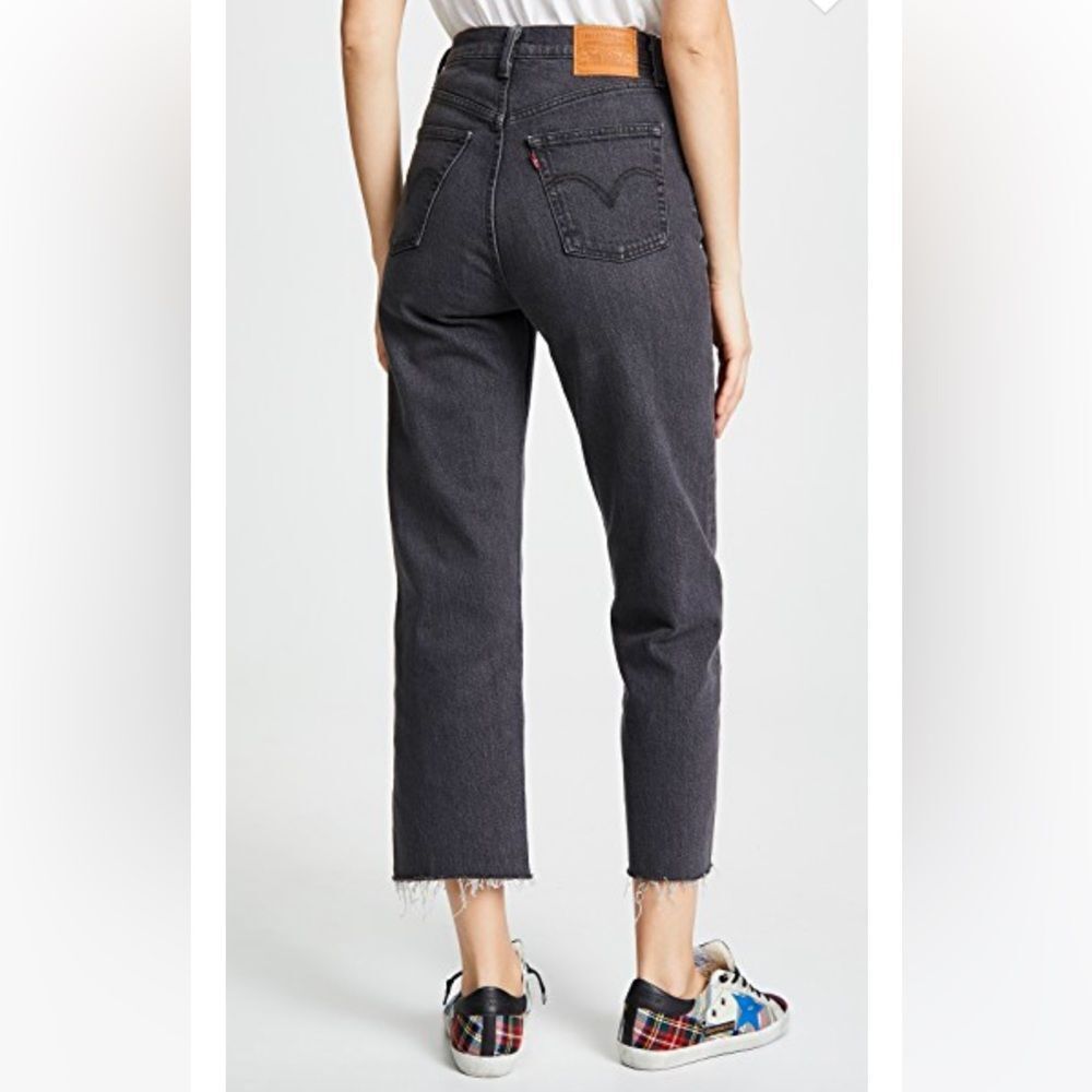 Levi's Ribcage Straight Raw Hem Ankle Jeans in Washed Black